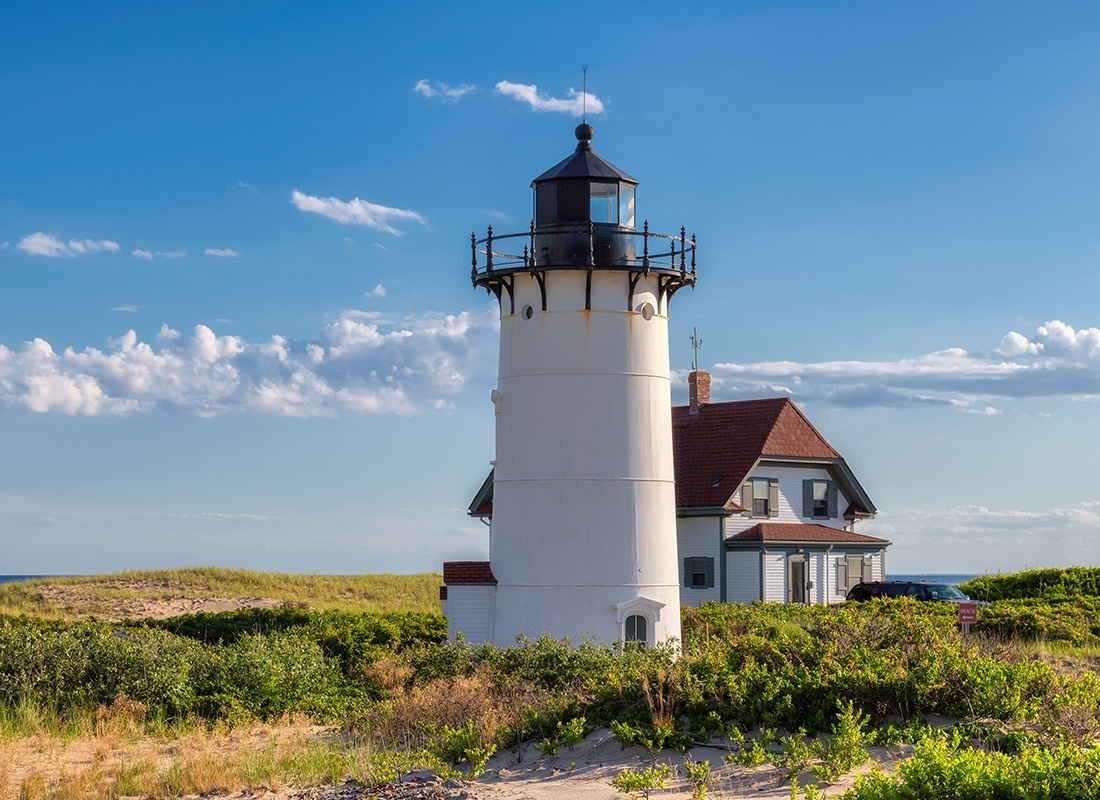 Service Center - Lighthouse on Cape Cod, Massachusetts on a Sunny Day